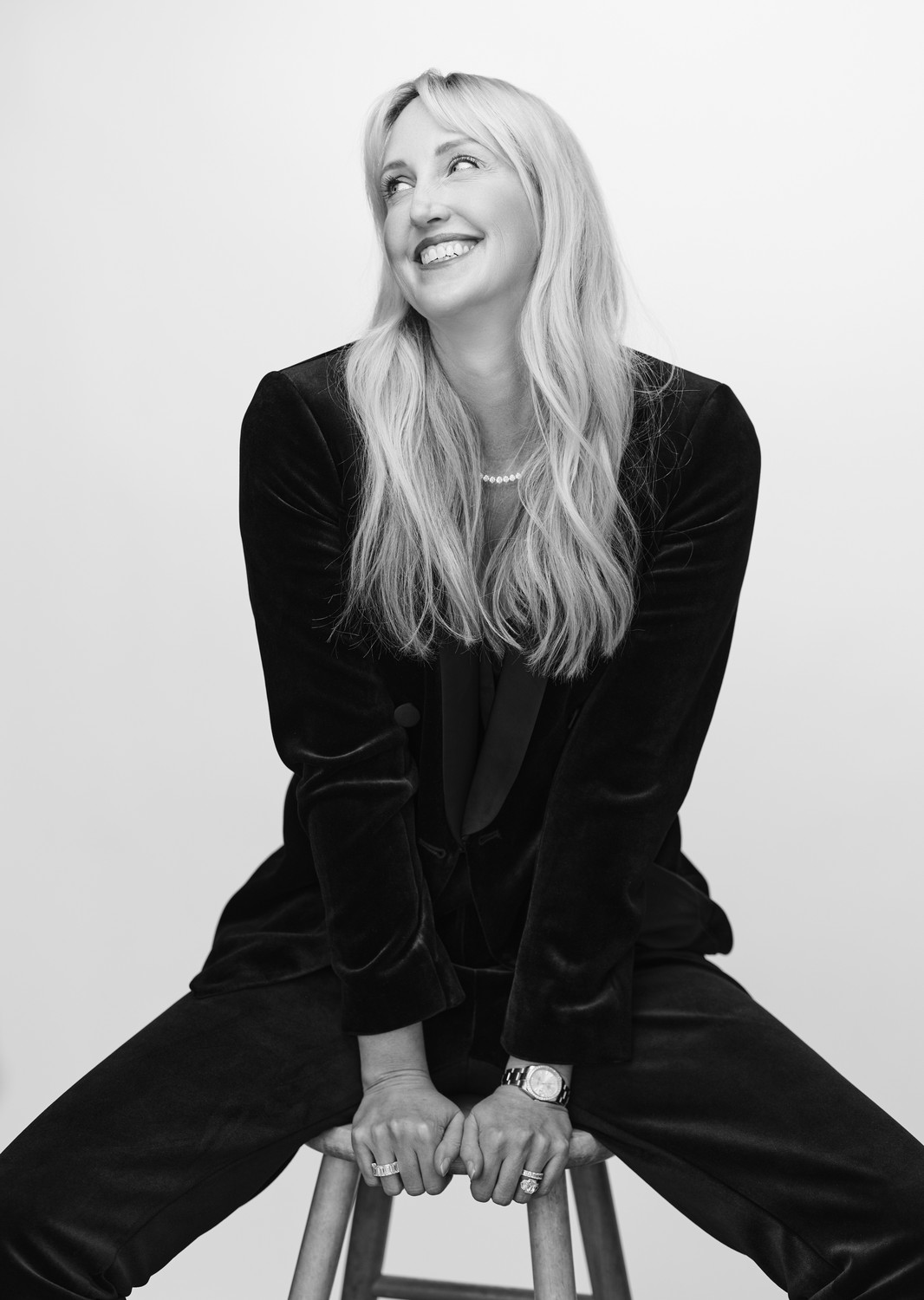 Lisa Zimowsky laughing on stool